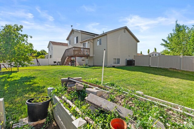 2456 W 1600 N, Clinton, UT 84015 - back of property with a garden, central AC unit, stairway, and a deck