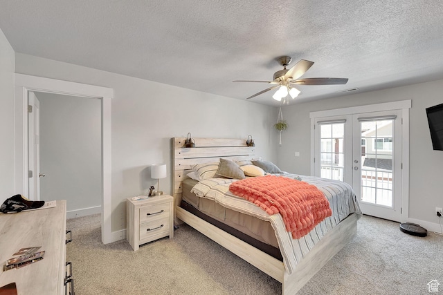 901 E 775 N, Layton, UT 84041 - bedroom with light colored carpet, access to outside, baseboards, french doors, and a textured ceiling