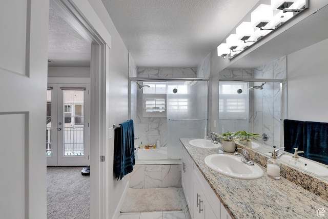 901 E 775 N, Layton, UT 84041 - bathroom featuring plenty of natural light, a textured ceiling, double vanity, and marble finish flooring