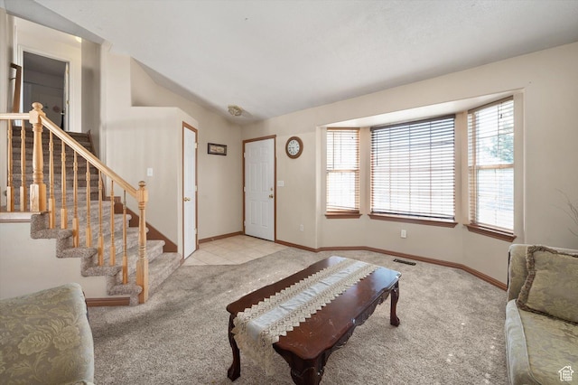 3139 S Timeron Dr, West Valley City, UT 84128 - carpeted foyer entrance with stairway and baseboards