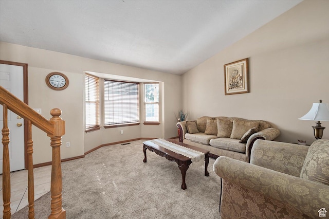 3139 S Timeron Dr, West Valley City, UT 84128 - living area with carpet, vaulted ceiling, baseboards, and stairway