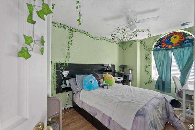 3139 S Timeron Dr, West Valley City, UT 84128 - bedroom with wood finished floors and ceiling fan