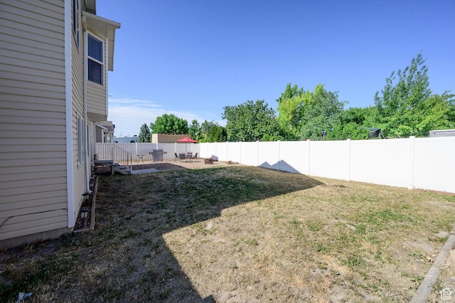 3139 S Timeron Dr, West Valley City, UT 84128 - view of yard with a patio