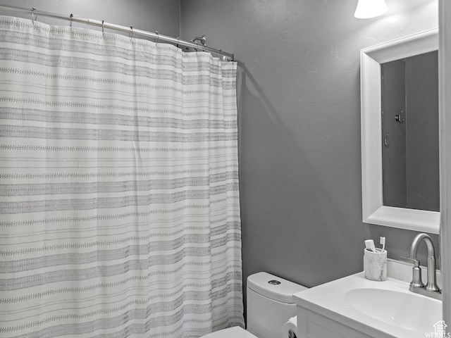 5103 W Laureston Way, Herriman, UT 84096 - bathroom with toilet, vanity, and curtained shower