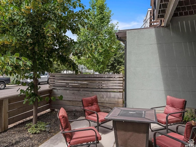 5103 W Laureston Way, Herriman, UT 84096 - view of patio featuring a fire pit