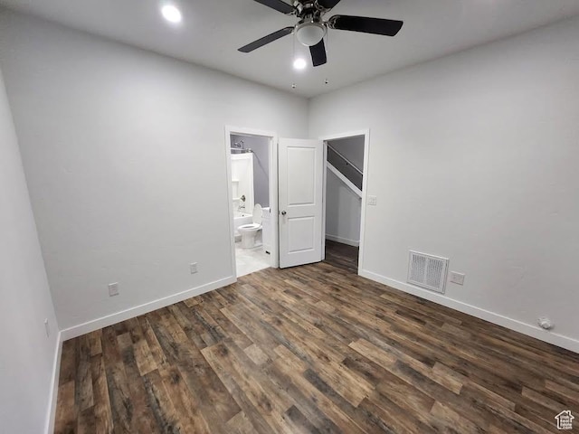 5103 W Laureston Way, Herriman, UT 84096 - unfurnished bedroom with wood finished floors, a walk in closet, connected bathroom, and baseboards
