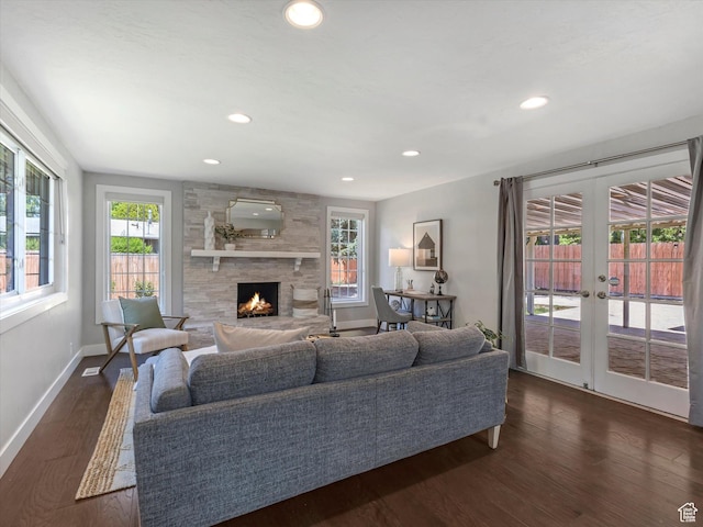 1555 E Fieldcrest Ln, Holladay, UT 84117 - living room with french doors, a fireplace, dark wood-type flooring, baseboards, and recessed lighting