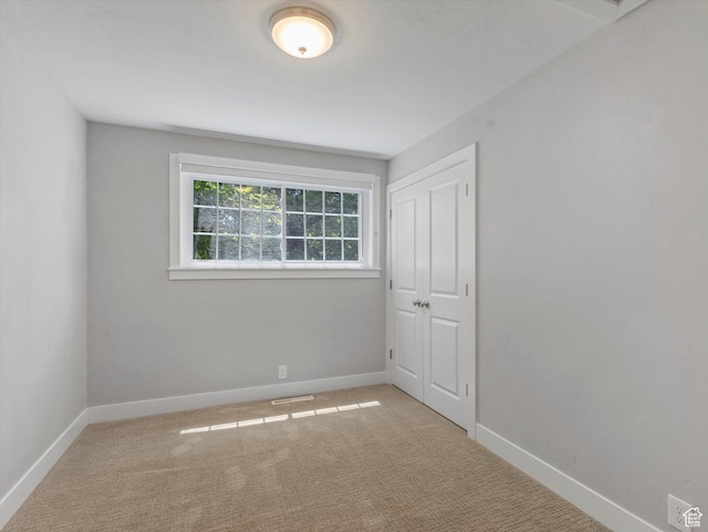 1555 E Fieldcrest Ln, Holladay, UT 84117 - spare room featuring baseboards and carpet floors