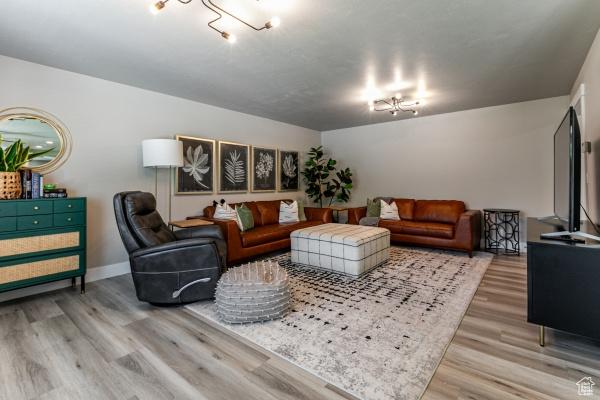 3007 W Sweet Clover Ln, South Jordan, UT 84095 - living area featuring wood finished floors