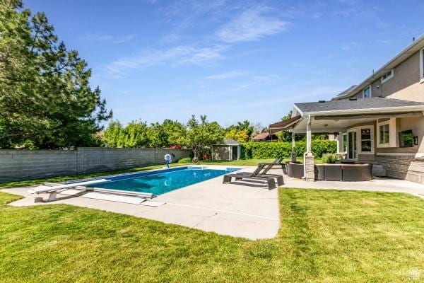 3007 W Sweet Clover Ln, South Jordan, UT 84095 - view of swimming pool with a patio, a diving board, and an outdoor hangout area