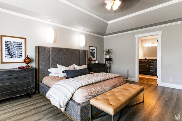 3007 W Sweet Clover Ln, South Jordan, UT 84095 - bedroom featuring wood finished floors, a tray ceiling, baseboards, crown molding, and ceiling fan