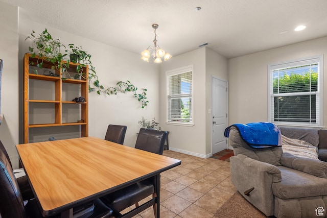 84 S 1630 W, Pleasant Grove, UT 84062 - dining room featuring a chandelier, healthy amount of natural light, light tile patterned floors, baseboards, and recessed lighting
