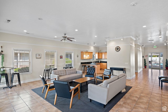 84 S 1630 W, Pleasant Grove, UT 84062 - living room featuring light tile patterned floors, ceiling fan, recessed lighting, crown molding, and baseboards