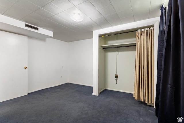 335 S 600 E, Smithfield, UT 84335 - unfurnished bedroom featuring dark colored carpet, baseboards, and a closet