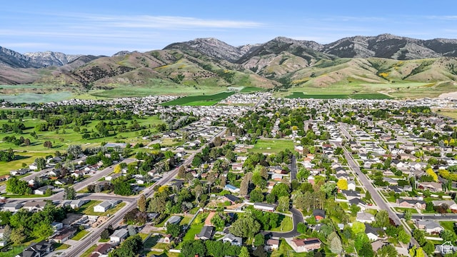 335 S 600 E, Smithfield, UT 84335 - aerial view of property and surrounding area with a mountain backdrop and nearby suburban area