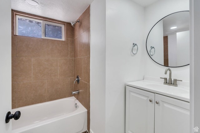 520 S Jeremy St W, Salt Lake City, UT 84104 - bathroom with vanity, shower / bath combination, and a textured ceiling