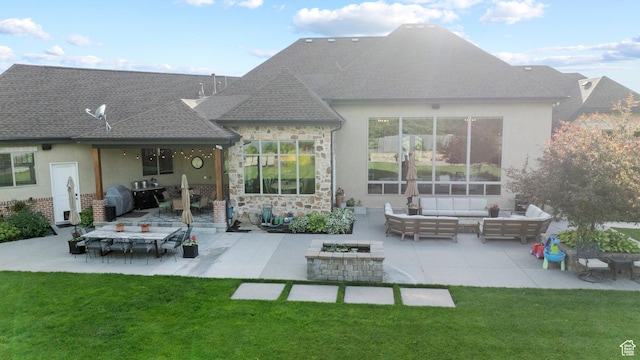 1827 S Hillcrest Cir, Mapleton, UT 84664 - back of house with an outdoor living space with a fire pit, a patio area, a lawn, and stucco siding