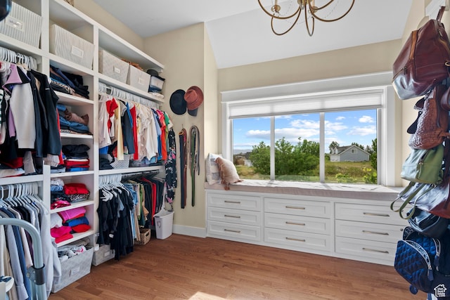 1827 S Hillcrest Cir, Mapleton, UT 84664 - walk in closet with a chandelier and light wood-style floors