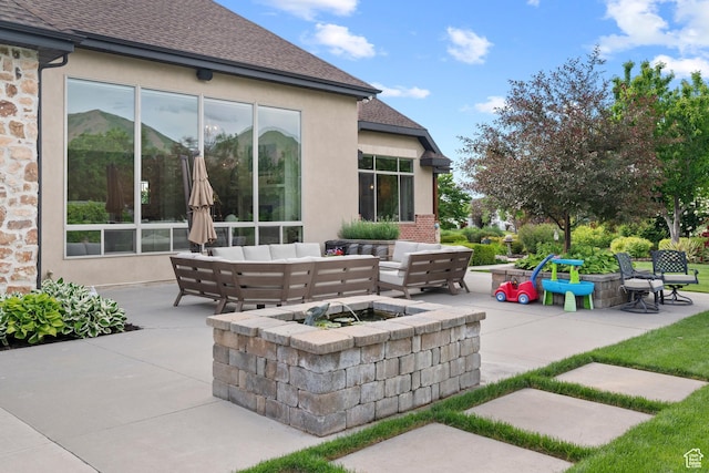 1827 S Hillcrest Cir, Mapleton, UT 84664 - view of patio / terrace with an outdoor living space with a fire pit