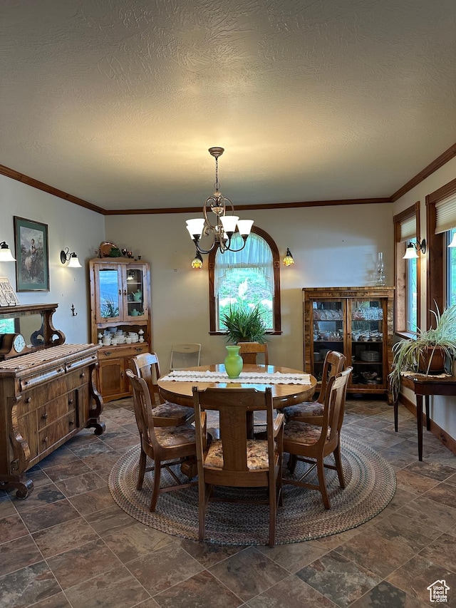 11730 E 24200 N, Fairview, UT 84629 - dining space with a chandelier, plenty of natural light, crown molding, a textured ceiling, and dark stone finish flooring