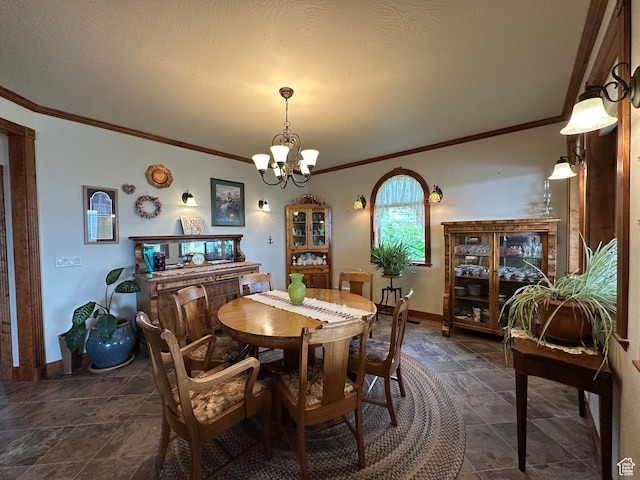 11730 E 24200 N, Fairview, UT 84629 - dining area with a chandelier, ornamental molding, baseboards, and dark stone finish floors