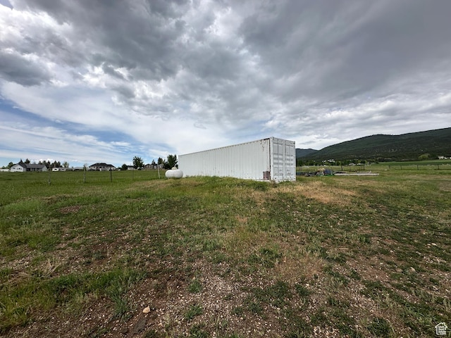 11730 E 24200 N, Fairview, UT 84629 - view of yard featuring a mountain view, a view of rural / pastoral area, and an outbuilding