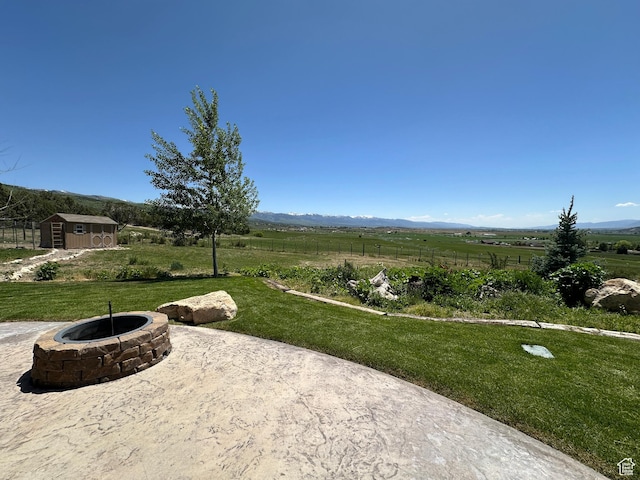 11730 E 24200 N, Fairview, UT 84629 - view of yard with a fire pit, a patio, a mountain view, and a view of rural / pastoral area