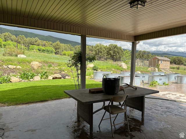 11730 E 24200 N, Fairview, UT 84629 - view of patio / terrace with area for grilling, outdoor dining area, a mountain view, and central AC unit