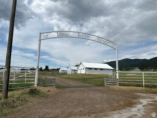 11730 E 24200 N, Fairview, UT 84629 - view of dirt / gravel driveway featuring a mountain view, a rural view, and a gated entry