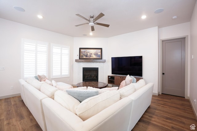 11579 S Pebble Pond Rd, South Jordan, UT 84009 - living room featuring ceiling fan, dark wood-style flooring, baseboards, a glass covered fireplace, and recessed lighting