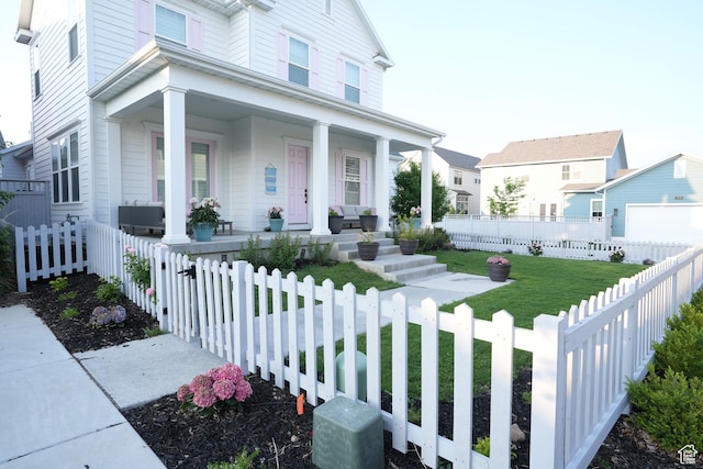 11579 S Pebble Pond Rd, South Jordan, UT 84009 - view of front facade featuring a porch, a garage, and a fenced front yard
