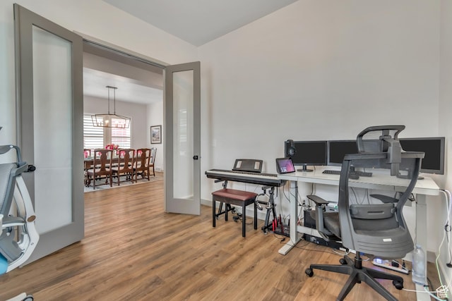 11579 S Pebble Pond Rd, South Jordan, UT 84009 - office featuring wood finished floors and a chandelier