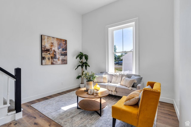 195 E 200 S, Nephi, UT 84648 - living room with stairs, wood finished floors, and baseboards