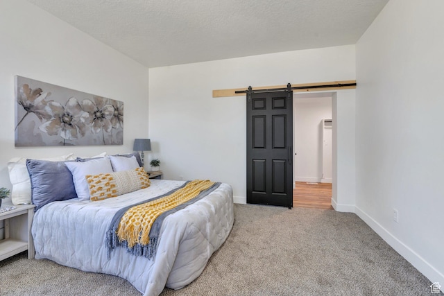 195 E 200 S, Nephi, UT 84648 - carpeted bedroom featuring a barn door and baseboards
