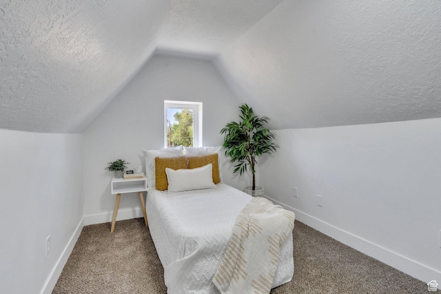 195 E 200 S, Nephi, UT 84648 - carpeted bedroom featuring a textured ceiling, lofted ceiling, and baseboards
