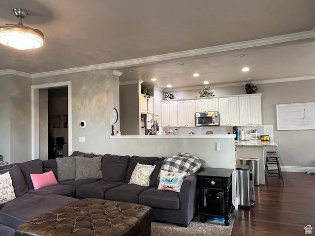 1107 E 1625 N, North Logan, UT 84341 - living area with dark wood-type flooring, recessed lighting, baseboards, and crown molding
