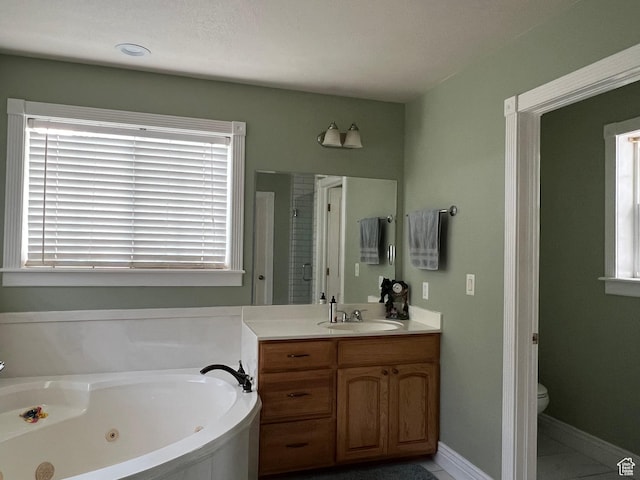 1107 E 1625 N, North Logan, UT 84341 - full bathroom with vanity, a whirlpool tub, toilet, baseboards, and a shower stall