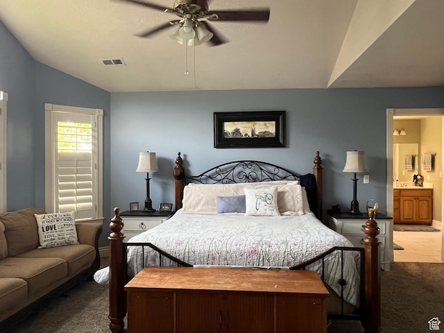 1107 E 1625 N, North Logan, UT 84341 - bedroom featuring carpet flooring, vaulted ceiling, ensuite bath, and a ceiling fan