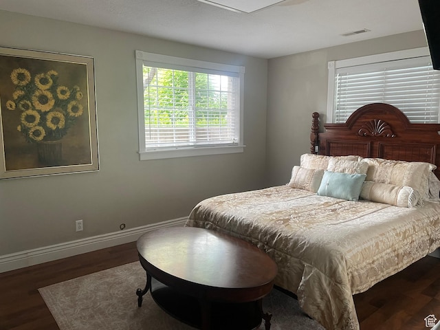 1107 E 1625 N, North Logan, UT 84341 - bedroom featuring wood finished floors and baseboards