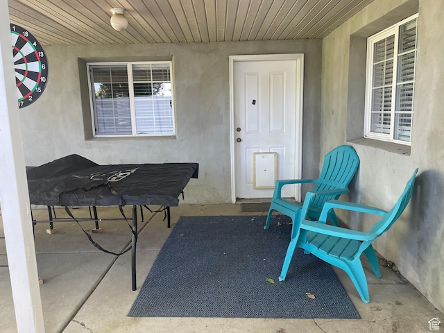 1107 E 1625 N, North Logan, UT 84341 - doorway to property with stucco siding and a patio