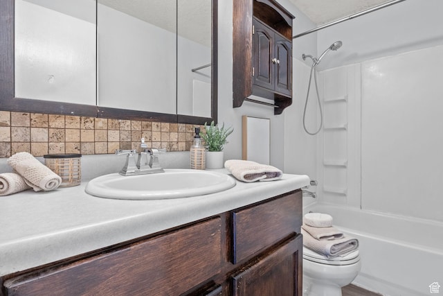 1522 W 1200 N, Layton, UT 84041 - bathroom featuring toilet, vanity, decorative backsplash, and shower / bath combination