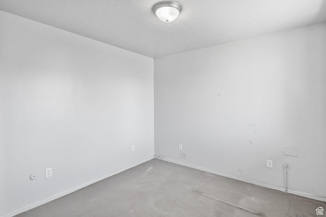 1522 W 1200 N, Layton, UT 84041 - empty room featuring concrete floors and baseboards