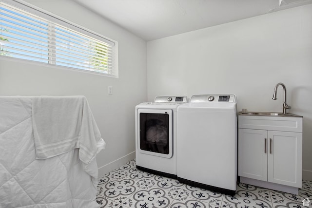8485 S 1575 E, Sandy, UT 84093 - laundry room with washing machine and dryer, cabinet space, baseboards, and light tile patterned floors