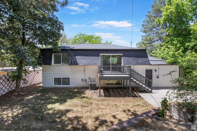 8485 S 1575 E, Sandy, UT 84093 - rear view of house with stairway, a shingled roof, cooling unit, and a deck