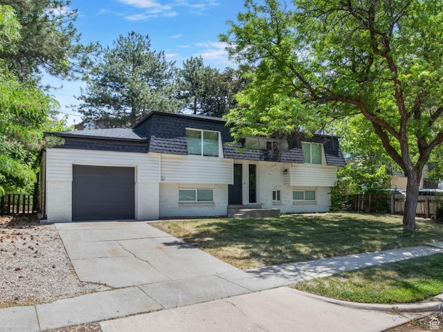8485 S 1575 E, Sandy, UT 84093 - view of front of home featuring mansard roof, a shingled roof, a garage, concrete driveway, and brick siding