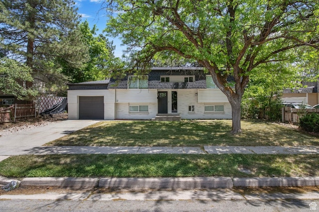 8485 S 1575 E, Sandy, UT 84093 - view of front facade featuring concrete driveway, an attached garage, and a balcony