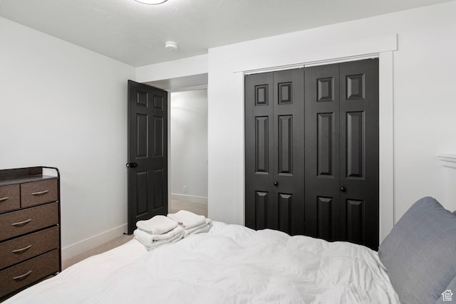 8485 S 1575 E, Sandy, UT 84093 - carpeted bedroom with baseboards and a closet
