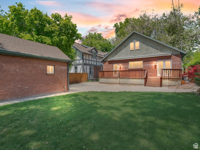 1146 E Harvard Ave S, Salt Lake City, UT 84105 - back of property with brick siding and a deck