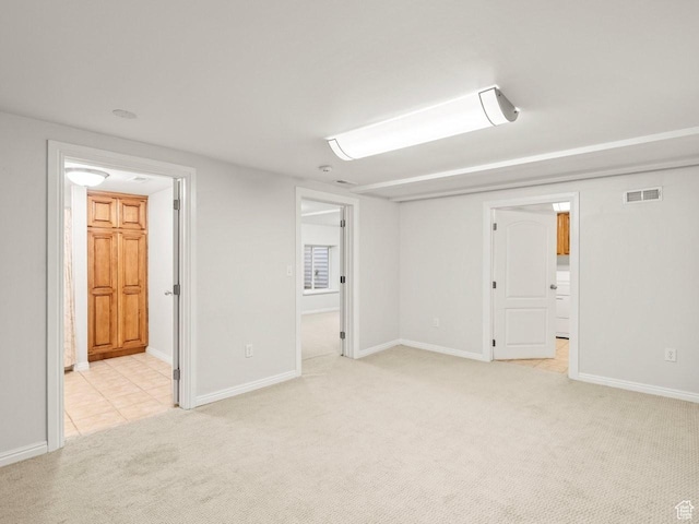 1146 E Harvard Ave S, Salt Lake City, UT 84105 - below grade area featuring light carpet and baseboards