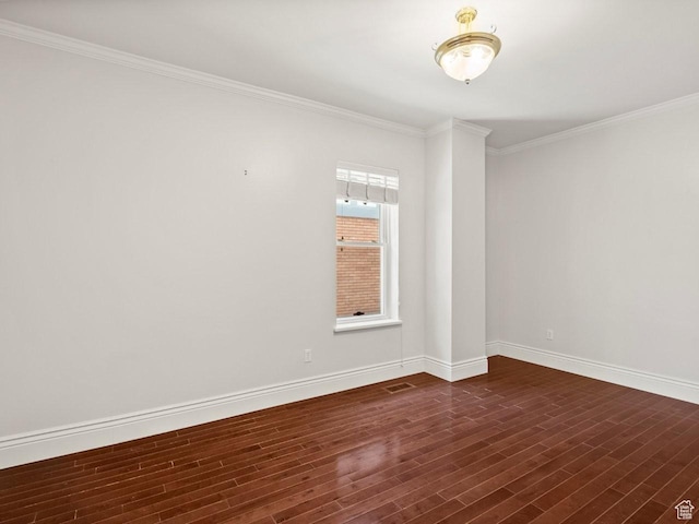 1146 E Harvard Ave S, Salt Lake City, UT 84105 - empty room featuring dark wood finished floors, crown molding, and baseboards